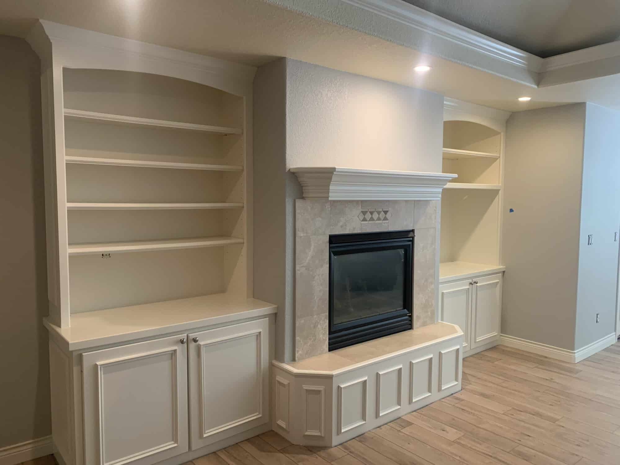 newly-painted-fireplace-area.jpg newly painted fireplace area, using white paint color
